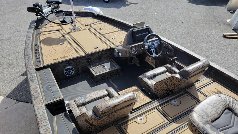 Slide: The Image of 2025 Xpress X19 Pro Bass boat interior with Yamaha 200 Vmax engine, in stock. - 4