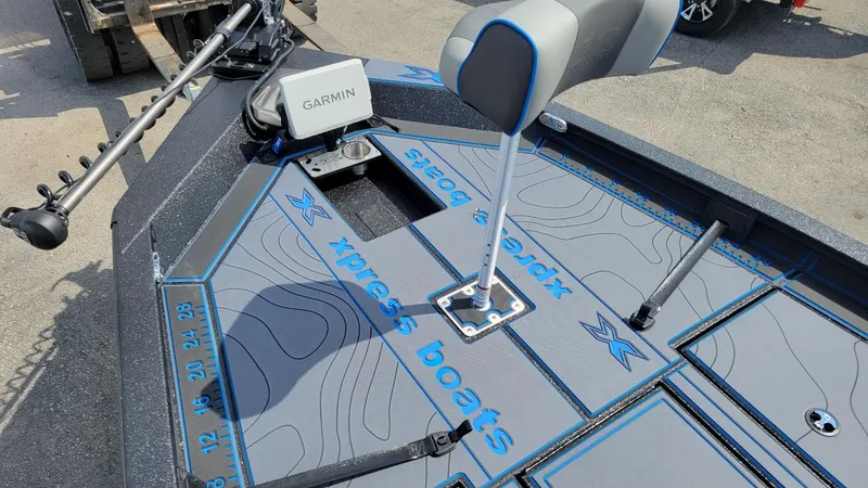 Slide: The Image of 2025 Xpress X21 Pro Bass boat deck with Garmin system and Yamaha Vmax 250. - 10