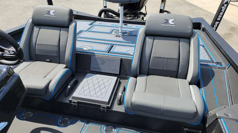 Slide: The Image of 2025 Xpress X21 Pro Bass boat interior with dual seats and Yamaha Vmax 250 engine. - 16