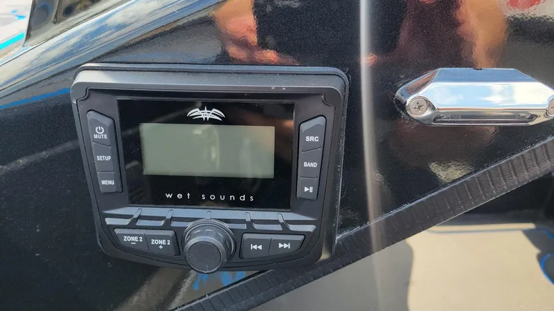 Slide: The Image of Wet Sounds audio system on 2025 Xpress X21 Pro Bass LE boat dashboard. - 17