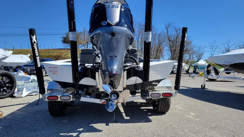 Slide: The Image of 2025 Xpress X21 Pro Bass boat with Yamaha Vmax 250 engine, rear view. - 15