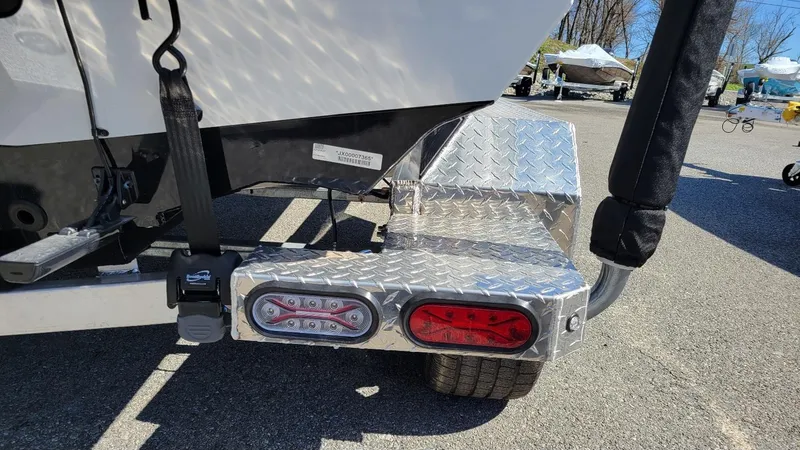 Slide: The Image of Rear view of 2025 Xpress X21 Pro Bass LE trailer with LED lights and diamond plate step. - 16