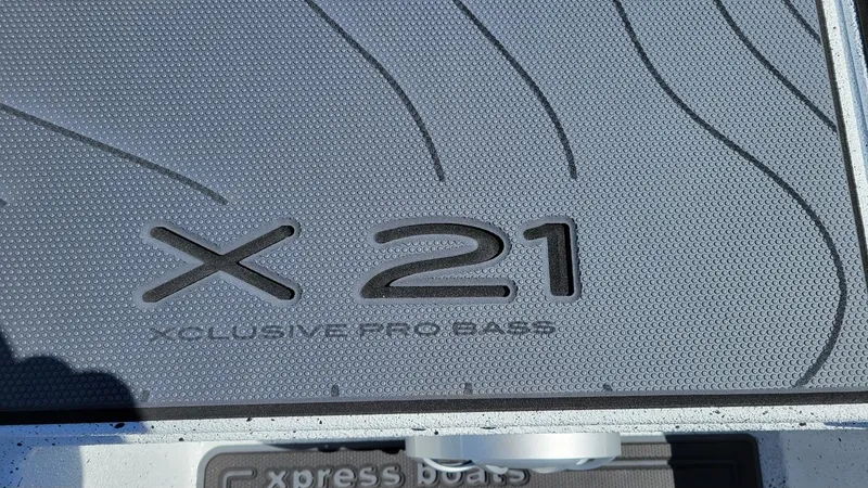 Slide: The Image of 2025 Xpress X21 Pro Bass boat deck with embossed logo design. - 20