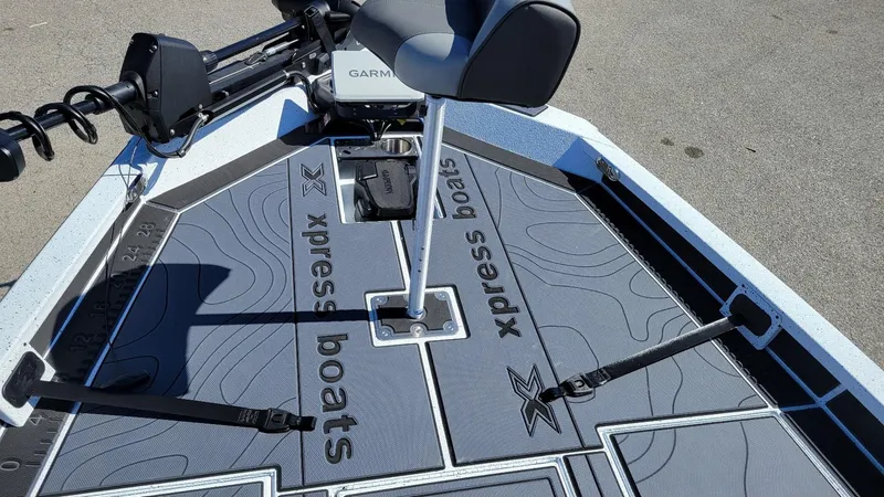 Slide: The Image of 2025 Xpress X21 Pro Bass LE boat deck with Garmin equipment and Yamaha Vmax 250. - 21