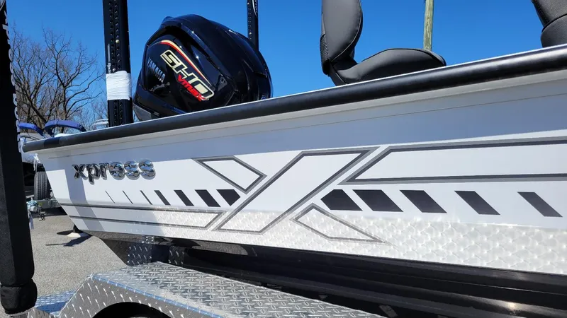 Slide: The Image of 2025 Xpress X21 Pro Bass boat with Yamaha Vmax 250 engine, sleek design, in stock. - 4