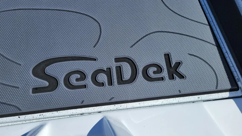 Slide: The Image of SeaDek flooring on 2025 Xpress X21 Pro Bass LE boat, featuring Yamaha Vmax 250 engine. - 6