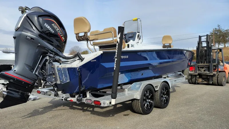 Slide: The Image of 2025 Xpress X23 Bay boat with Yamaha Vmax 200 SHO engine on trailer. - 14