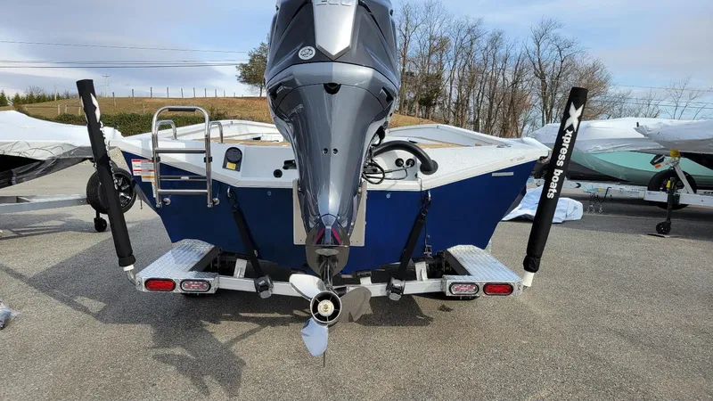 Slide: The Image of 2025 Xpress X23 Bay boat with Yamaha Vmax 200 SHO engine, rear view. - 16