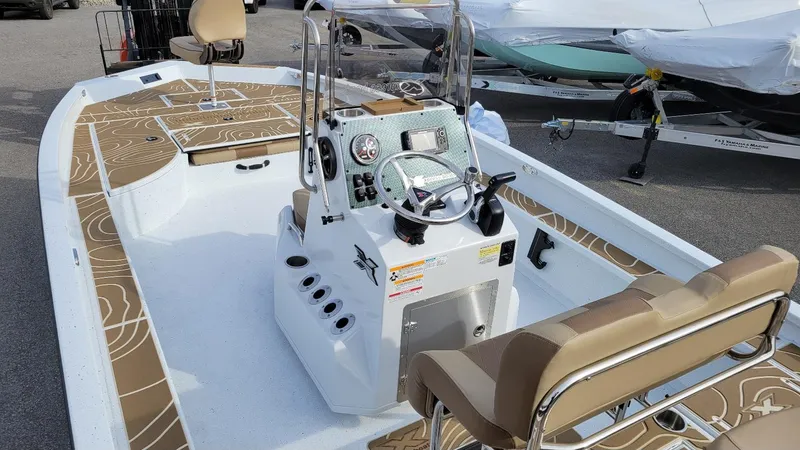 Slide: The Image of 2025 Xpress X23 Bay boat with Yamaha Vmax 200 SHO, featuring spacious deck and modern controls. - 17