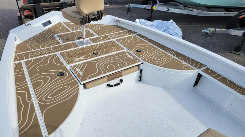 Slide: The Image of 2025 Xpress X23 Bay boat interior with Yamaha Vmax 200 SHO, featuring stylish deck design. - 19