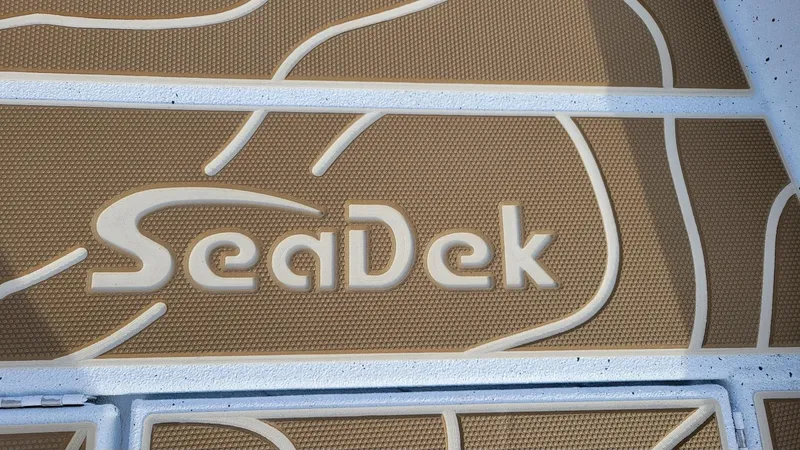 Slide: The Image of SeaDek flooring on 2025 Xpress X23 Bay boat with Yamaha Vmax 200 SHO. - 21