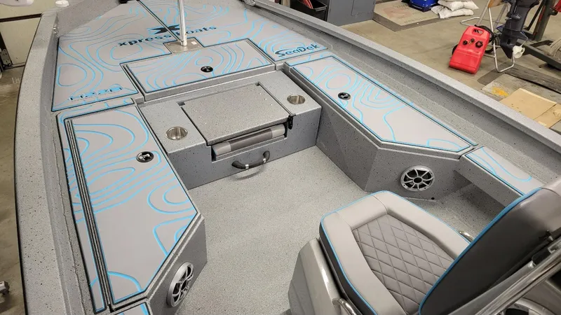 Slide: The Image of 2025 Xpress H22 Bay boat interior with Yamaha Vmax 200 SHO, featuring SeaDek flooring. - 5