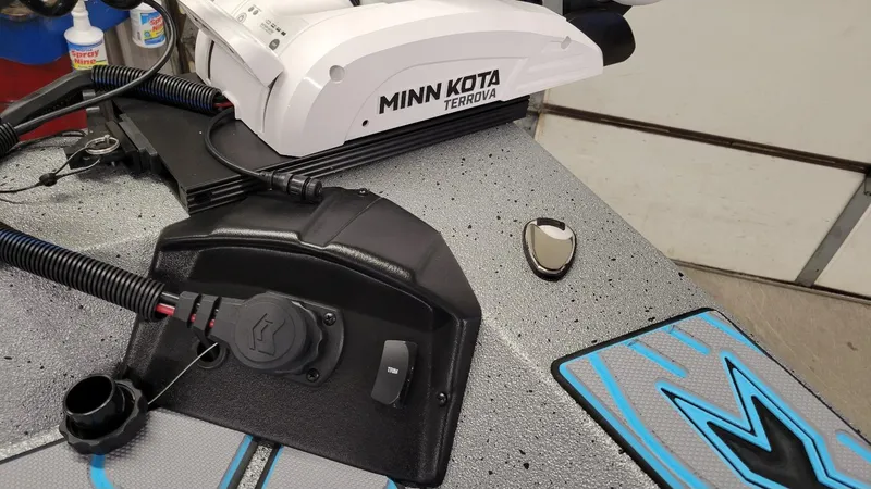 Slide: The Image of 2025 Xpress H22 Bay boat with Minn Kota Terrova trolling motor, featuring Yamaha Vmax 200 SHO. - 8