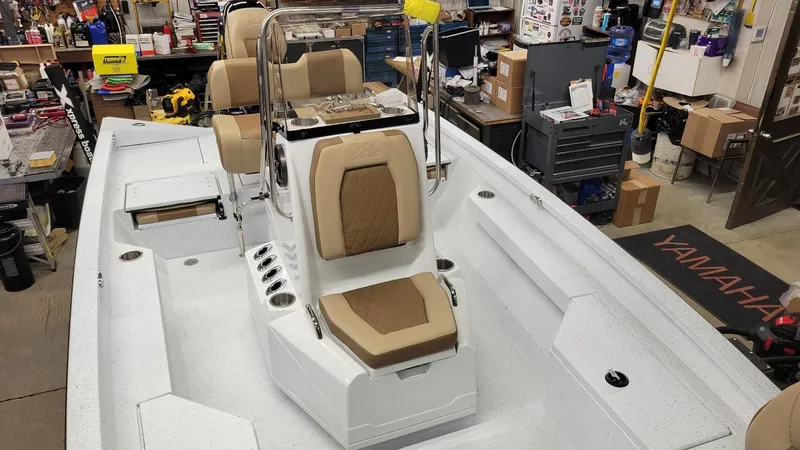 Slide: The Image of 2025 Xpress H20 Bay boat with Yamaha Vmax 115 SHO, showcased in a workshop setting. - 14