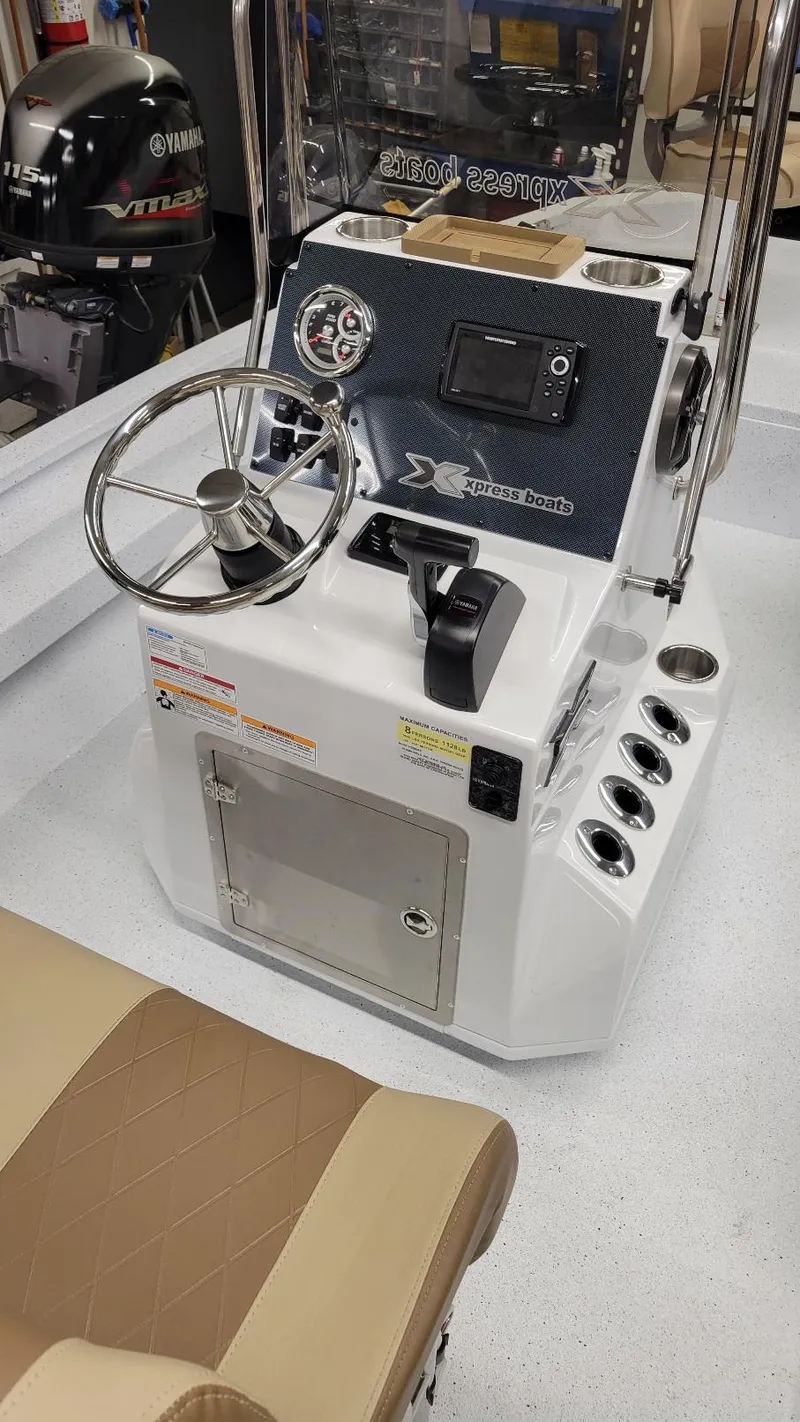 Slide: The Image of 2025 Xpress H20 Bay boat console with Yamaha Vmax 115 SHO engine. - 18