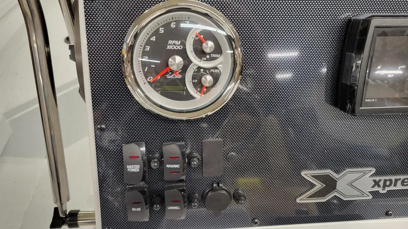 Slide: The Image of Dashboard of 2025 Xpress H20 Bay boat with Yamaha Vmax 115 SHO controls. - 20