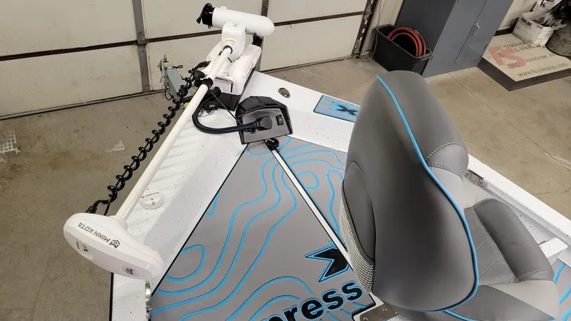Slide: The Image of 2025 Xpress H20 Bay boat interior with Minn Kota trolling motor. - 15