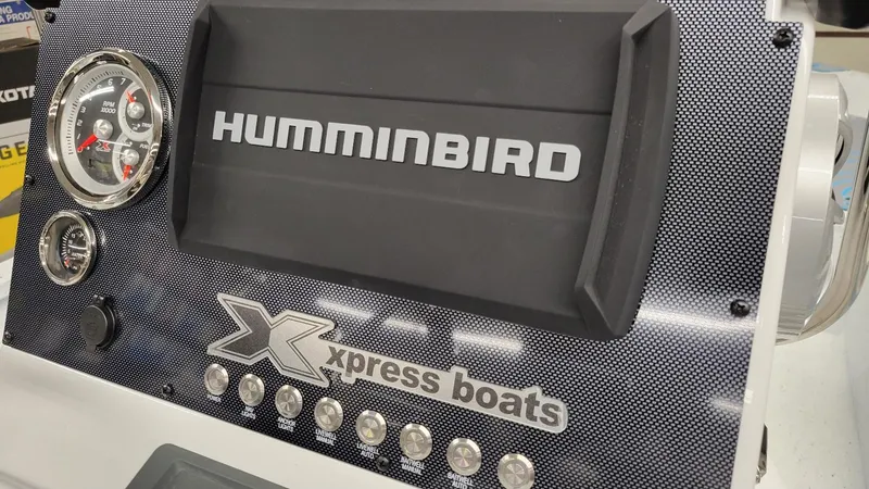Slide: The Image of Dashboard of 2025 Xpress H20 Bay boat with Humminbird display and Yamaha Vmax 150 SHO. - 22