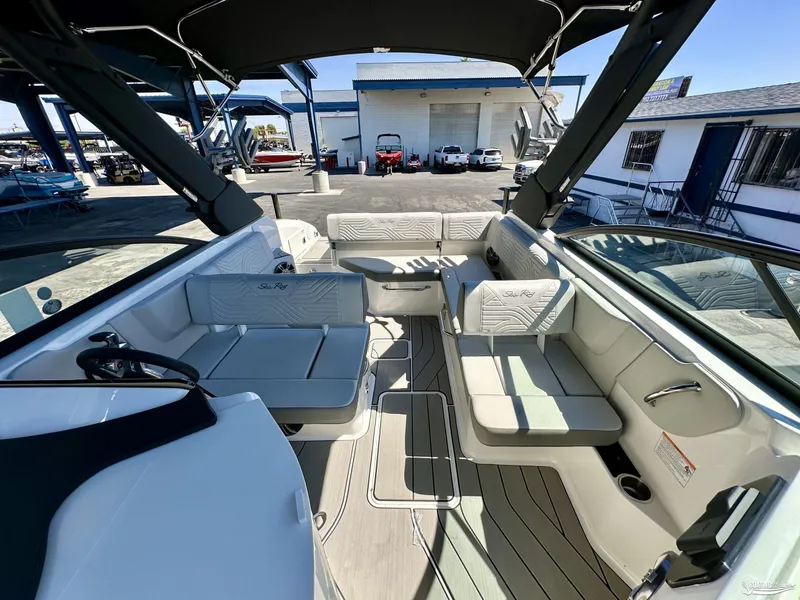 Slide: The Image of 2025 Sea Ray SDX 250 Surf boat interior with spacious seating and modern design. - 10