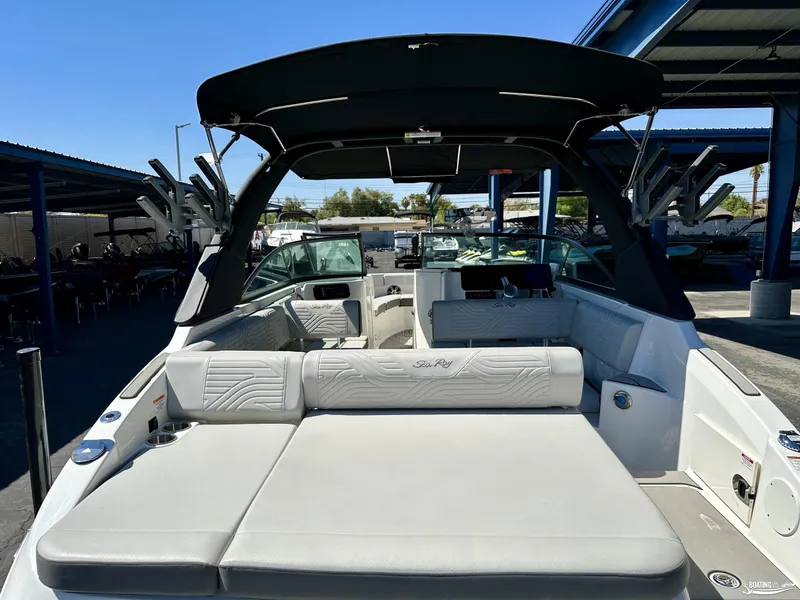 Slide: The Image of 2025 Sea Ray SDX 250 Surf boat interior with spacious seating and sleek design. - 3