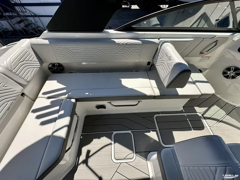 Slide: The Image of 2025 Sea Ray SDX 250 Surf boat interior with stylish seating and modern design. - 6