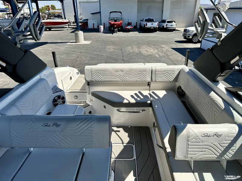 Slide: The Image of 2025 Sea Ray SDX 250 Surf boat interior with luxurious seating and modern design. - 7