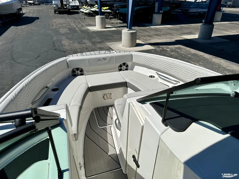 Slide: The Image of 2025 Sea Ray SDX 250 Surf boat interior with spacious seating and modern design. - 8