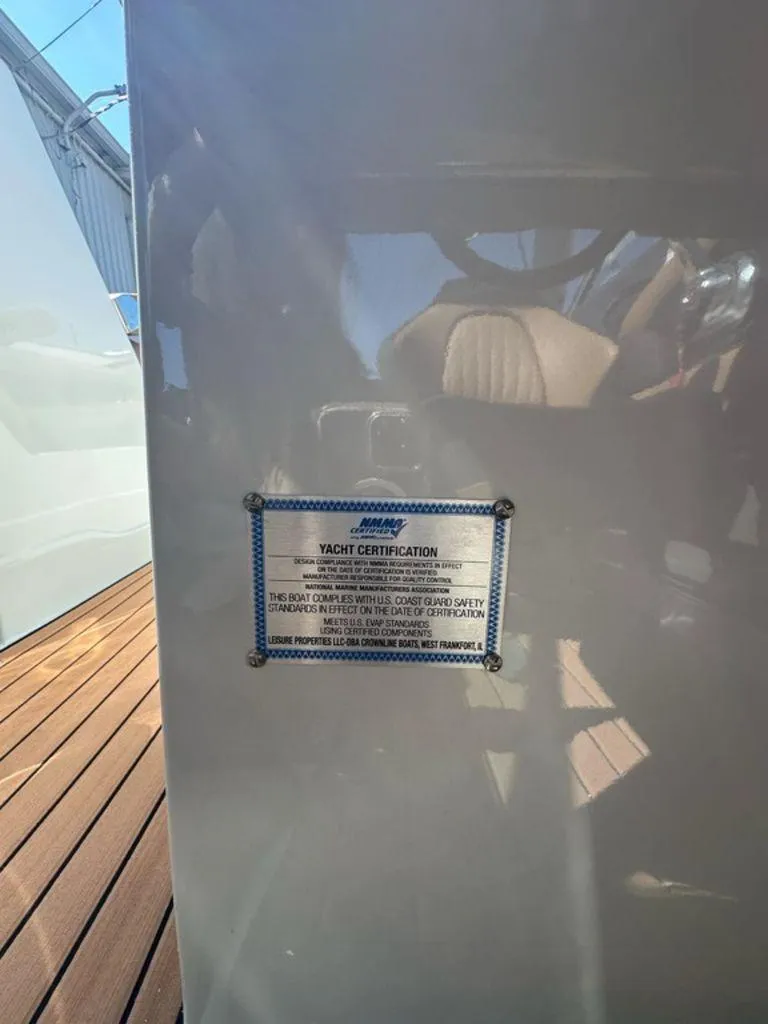 Slide: The Image of Crownline 270 SS 2025 yacht certification plaque on deck. - 12