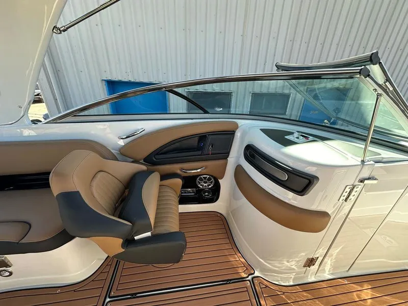 Slide: The Image of Interior of 2025 Crownline 270 SS boat with luxurious seating and modern design. - 13
