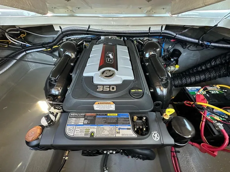 Slide: The Image of 2025 Crownline 270 SS boat engine compartment with Mercury 350 engine. - 19