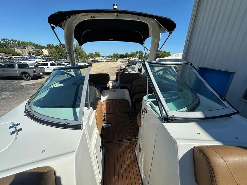 Slide: The Image of 2025 Crownline 270 SS boat with open cockpit and sleek design. - 9