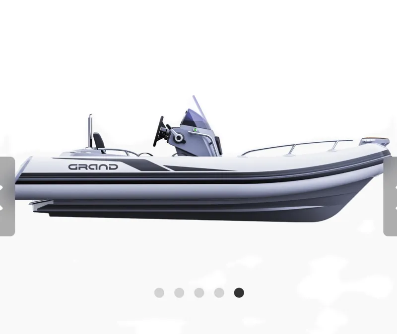 Slide: The Image of 2021 Grand Inflatables G420 boat, sleek design, side view on white background. - 7