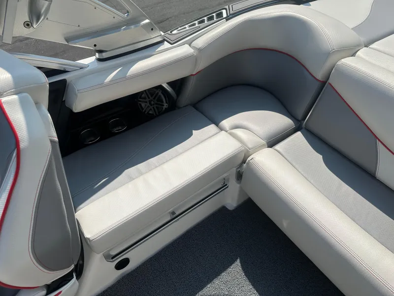Slide: The Image of Interior of a 2017 MasterCraft XT20 boat with gray upholstery. - 15