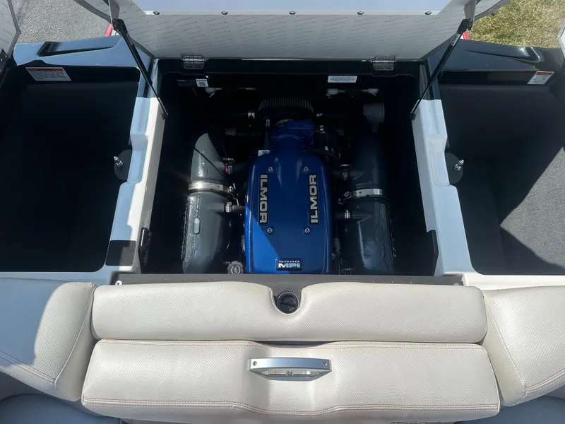 Slide: The Image of 2017 MasterCraft XT20 engine compartment with Ilmor engine. - 18