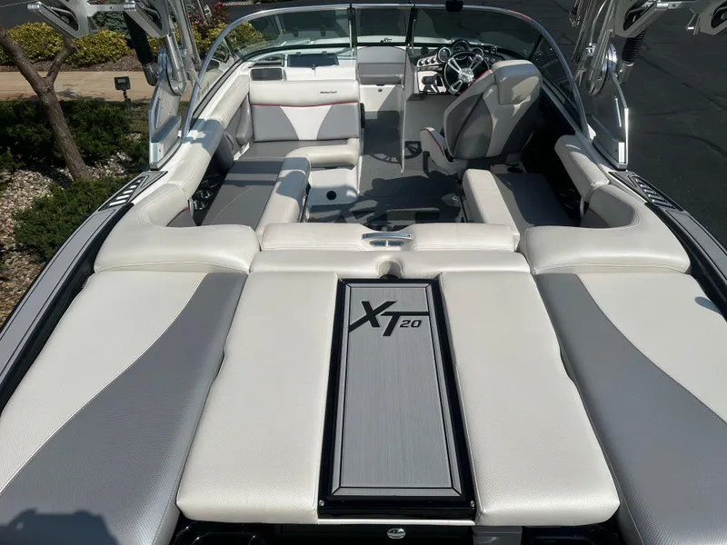 Slide: The Image of Interior of a 2017 MasterCraft XT20 boat with luxurious seating. - 7