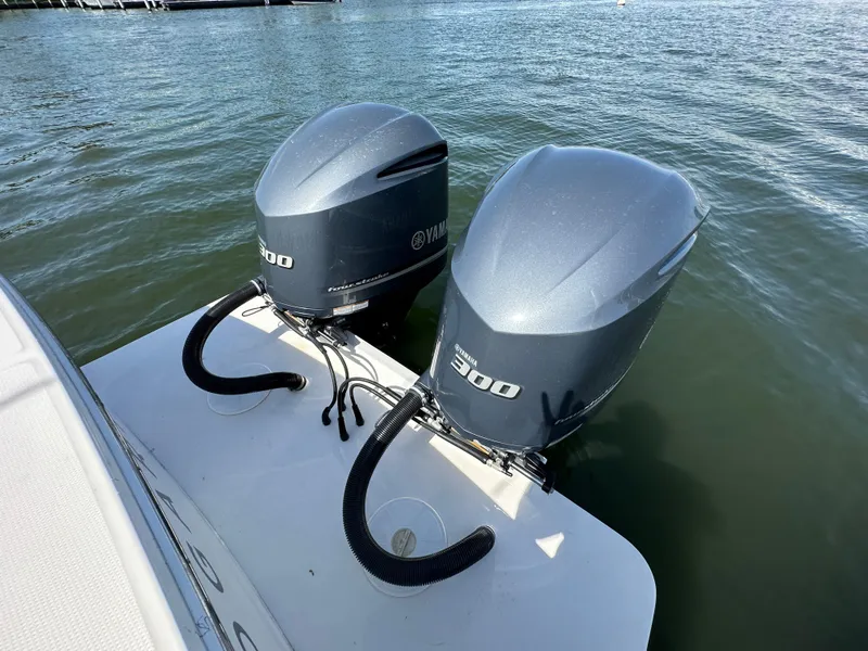 Slide: The Image of Twin Yamaha 300 outboard engines on a 2017 Regulator 31 boat. - 22