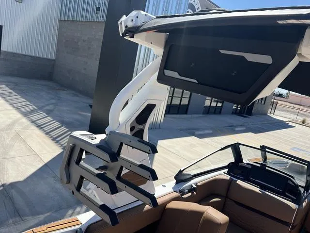 Slide: The Image of 2025 Supra SA 450 boat interior with advanced wakeboard tower design. - 19