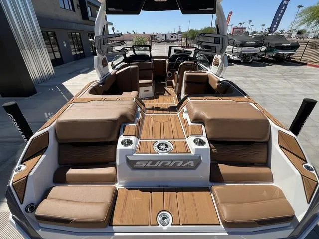 Slide: The Image of 2025 Supra SA 450 boat with luxurious seating and modern design. - 9