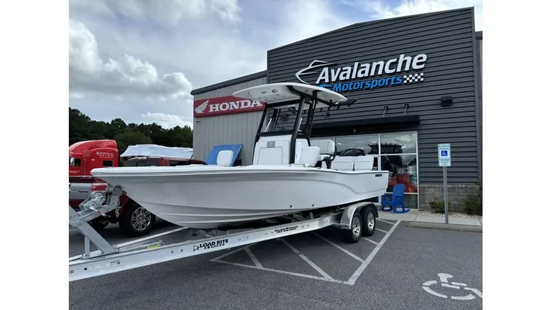 The Image of 2025 Sea Fox 251 Bay Fox boat on trailer at Avalanche Motorsports dealership. - 0