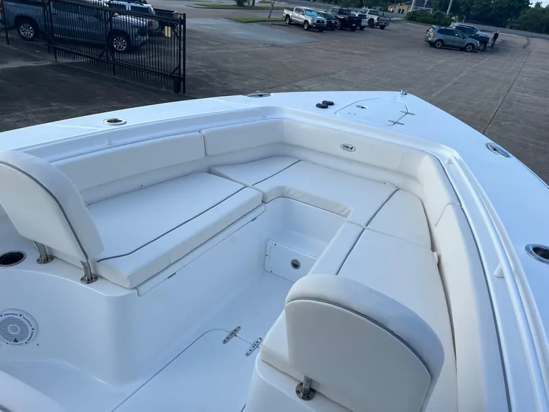 Slide: The Image of 2024 Sea Hunt Gamefish 27 FS boat with spacious seating and sleek design. - 13