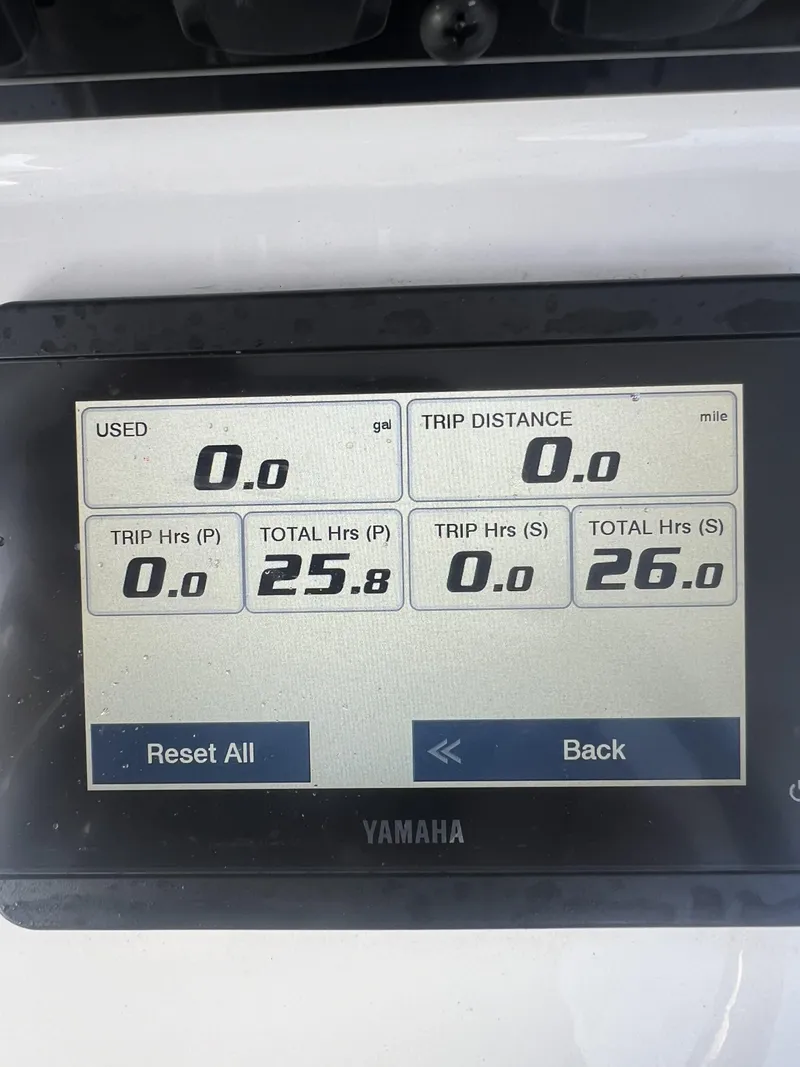 Slide: The Image of Yamaha display on 2024 Sea Hunt Gamefish 27 FS showing trip and total hours. - 16