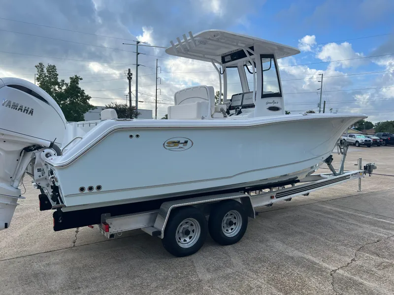 Slide: The Image of 2024 Sea Hunt Gamefish 27 FS boat on trailer, side view. - 6