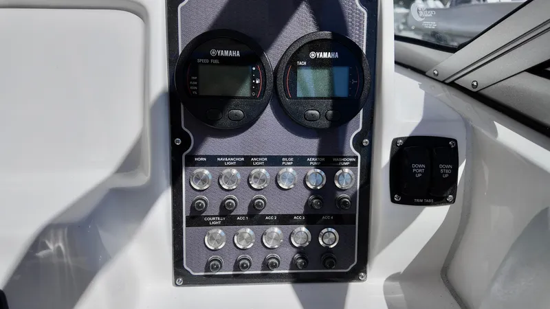 Slide: The Image of Control panel of 2025 Sea Fox 228 Traveler boat with Yamaha gauges and switches. - 11