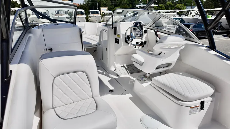Slide: The Image of 2025 Sea Fox 228 Traveler boat interior with white seating and modern dashboard. - 27
