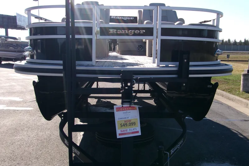 Slide: The Image of 2024 Ranger Reata 220F pontoon boat on display with price tag of $49,099. - 4