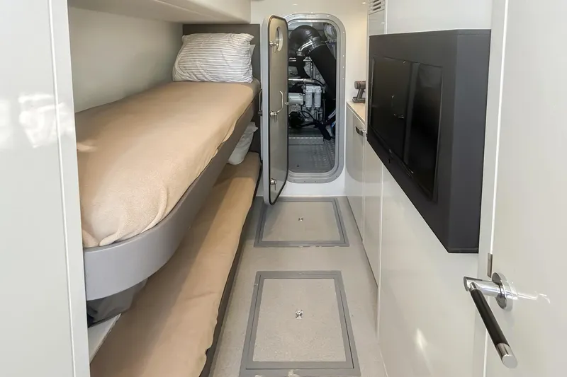 Slide: The Image of Interior of 2020 Princess 78 yacht with bunk beds and modern design. - 11