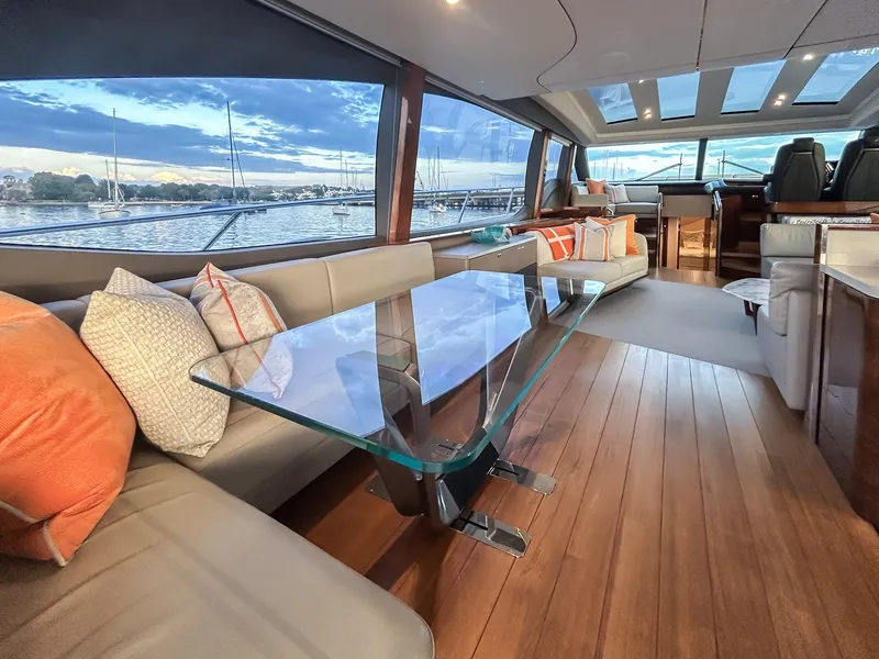 Slide: The Image of Luxurious 2020 Princess 78 yacht interior with elegant seating and glass table. - 16