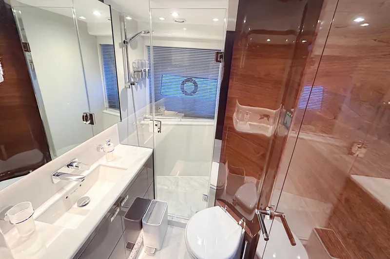 Slide: The Image of Luxurious bathroom in 2020 Princess 78 yacht with modern fixtures and elegant design. - 4