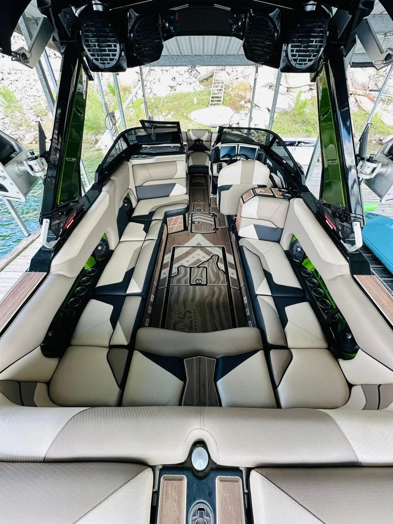 Slide: The Image of Luxurious interior of 2021 Centurion Ri245 boat with spacious seating and modern design. - 28