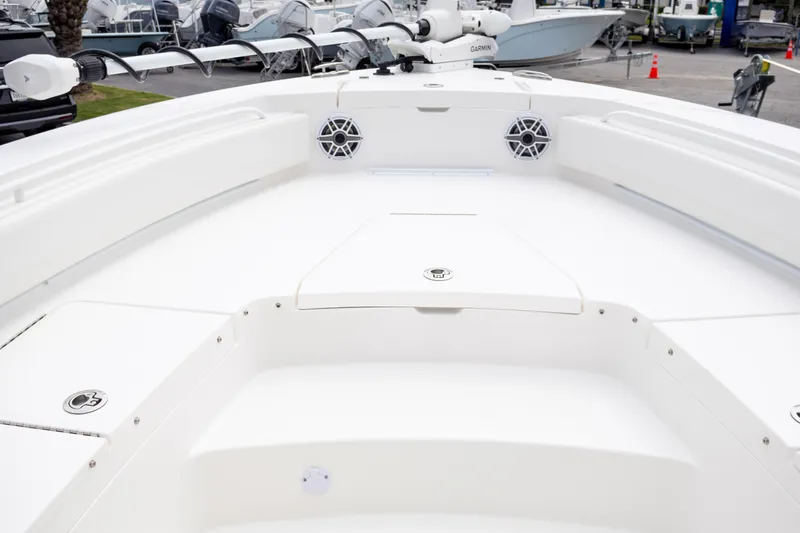 Slide: The Image of 2025 Regulator 26XO boat deck with seating and storage compartments. - 20